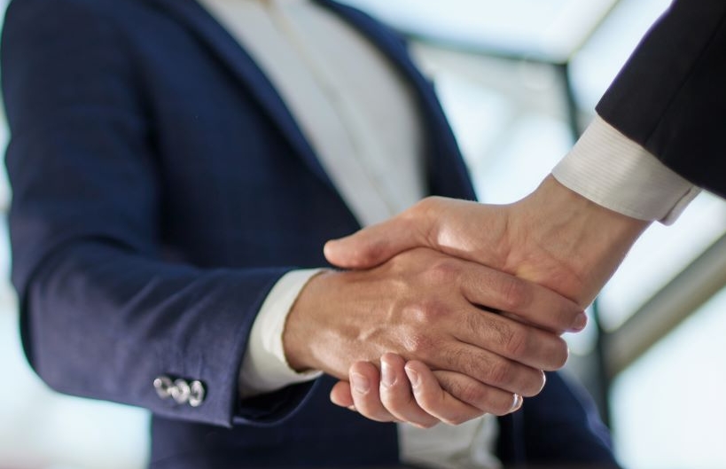 Business partnership meeting concept. Image businessman's handshake