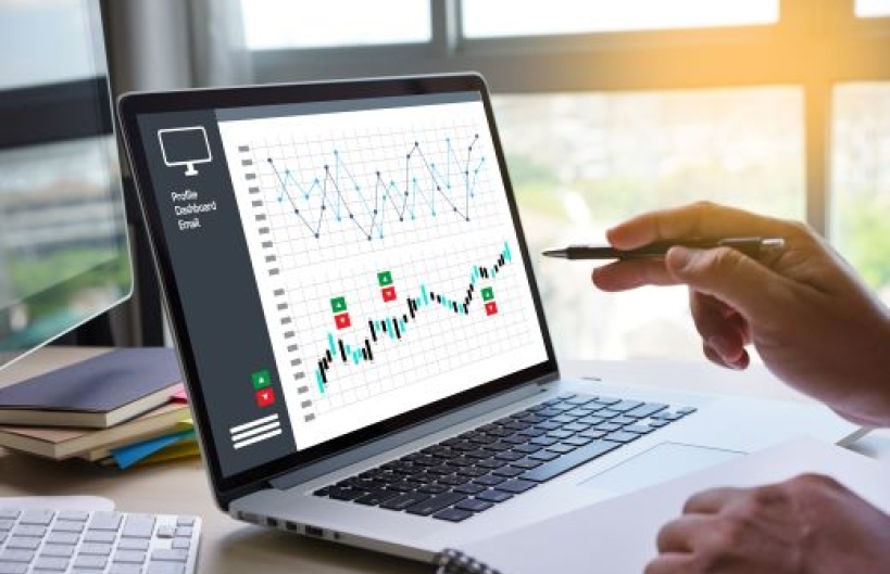 Laptop with revenue graph